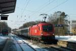 1116 168 mit EC 1113 bei der Einfahrt in Gnzburg am 11.02.2012.